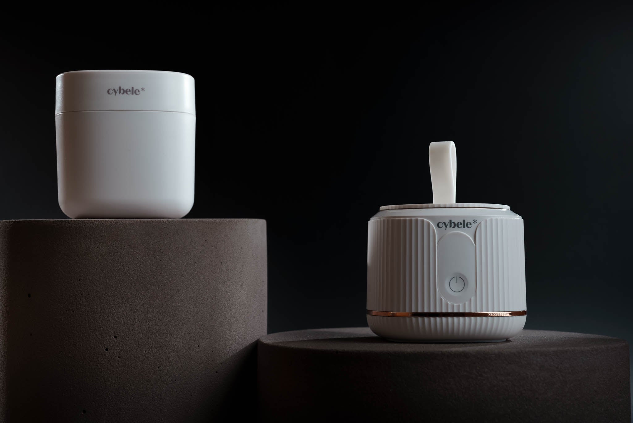 Cybele Star’s award-winning baby essentials — Stellar™ Portable Baby Bottle Warmer and Lumen™ Portable UV Sterilizer side by side.