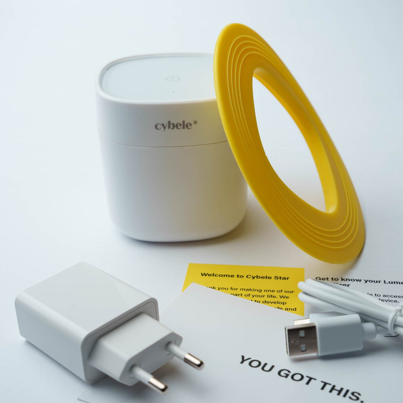 Lumen Portable UV Sterilizer: The box includes Lumen™ Portable UV Sterilizer, Silicone Extension Pad, USB-C cable, Power Adapter, and a QR code to the User Manual.