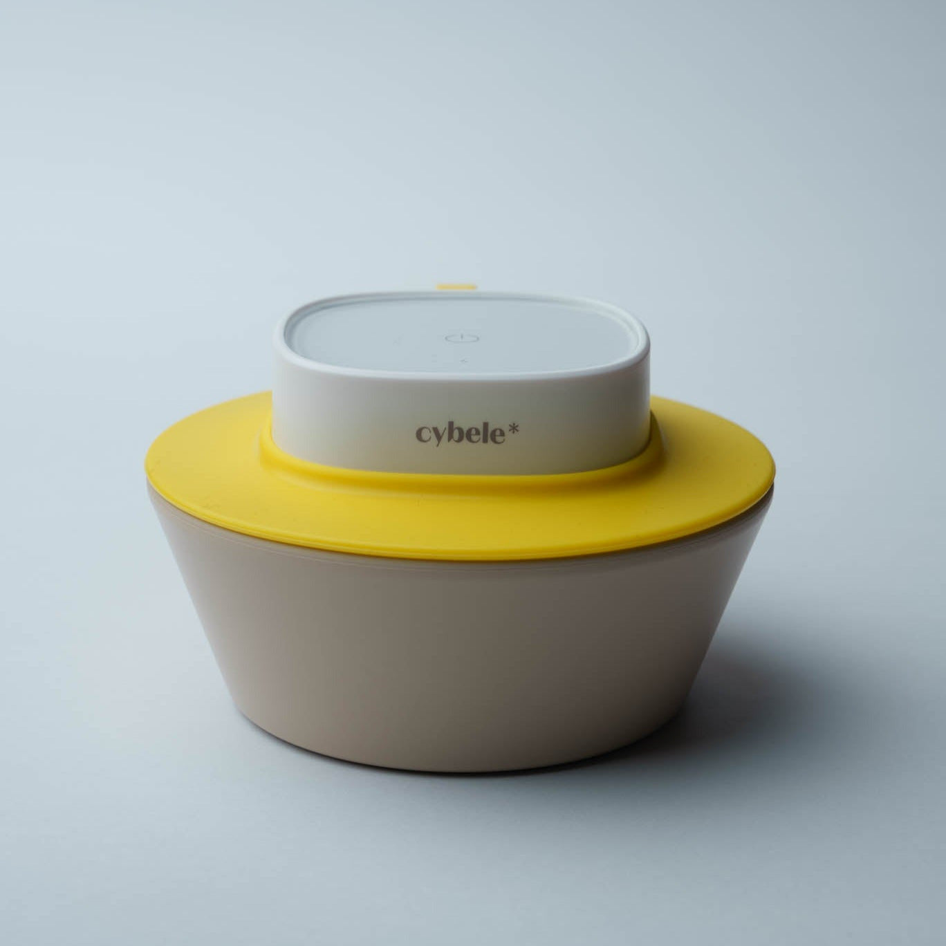 Lumen Portable UV Sterilizer connected to its extension pad, designed for effective cleaning and disinfection of bowls and portable baby food warmers.
