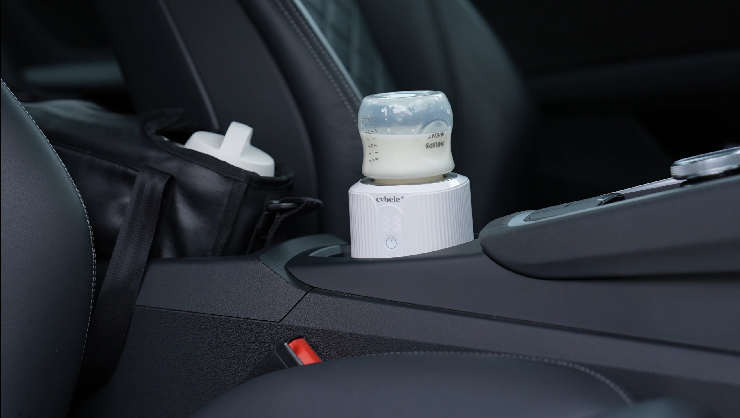 Calienta Biberones Portátil Stellar™: perfecto para calentar la leche materna o fórmula en el coche, en el avión, en el parque, en la playa o en casa.
