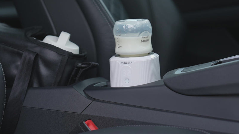 Calienta Biberones Portátil Stellar™: perfecto para calentar la leche materna o fórmula en el coche, en el avión, en el parque, en la playa o en casa.